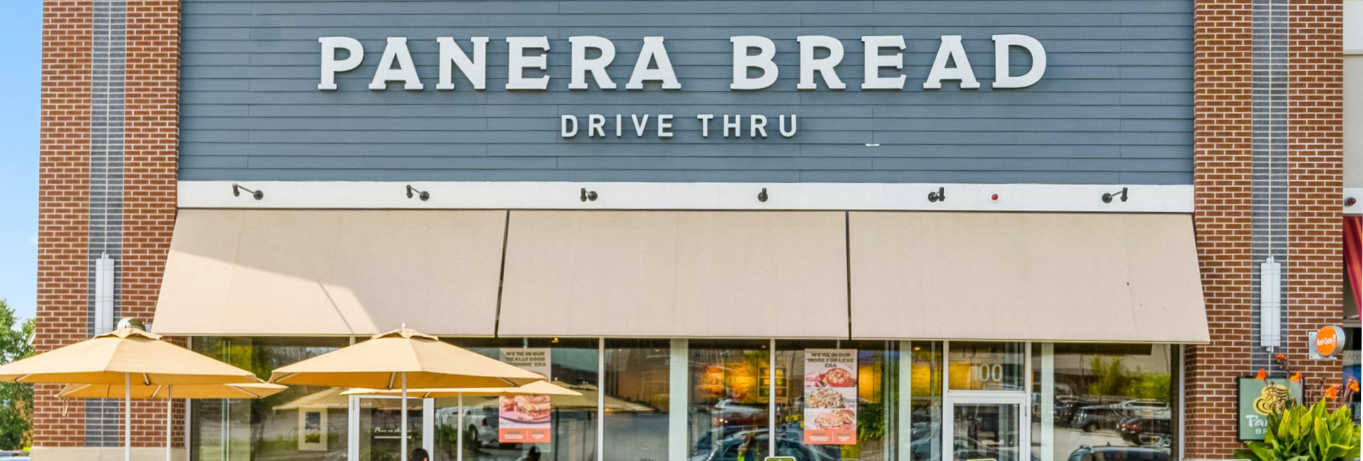 Panera Bread storefront with dining area
